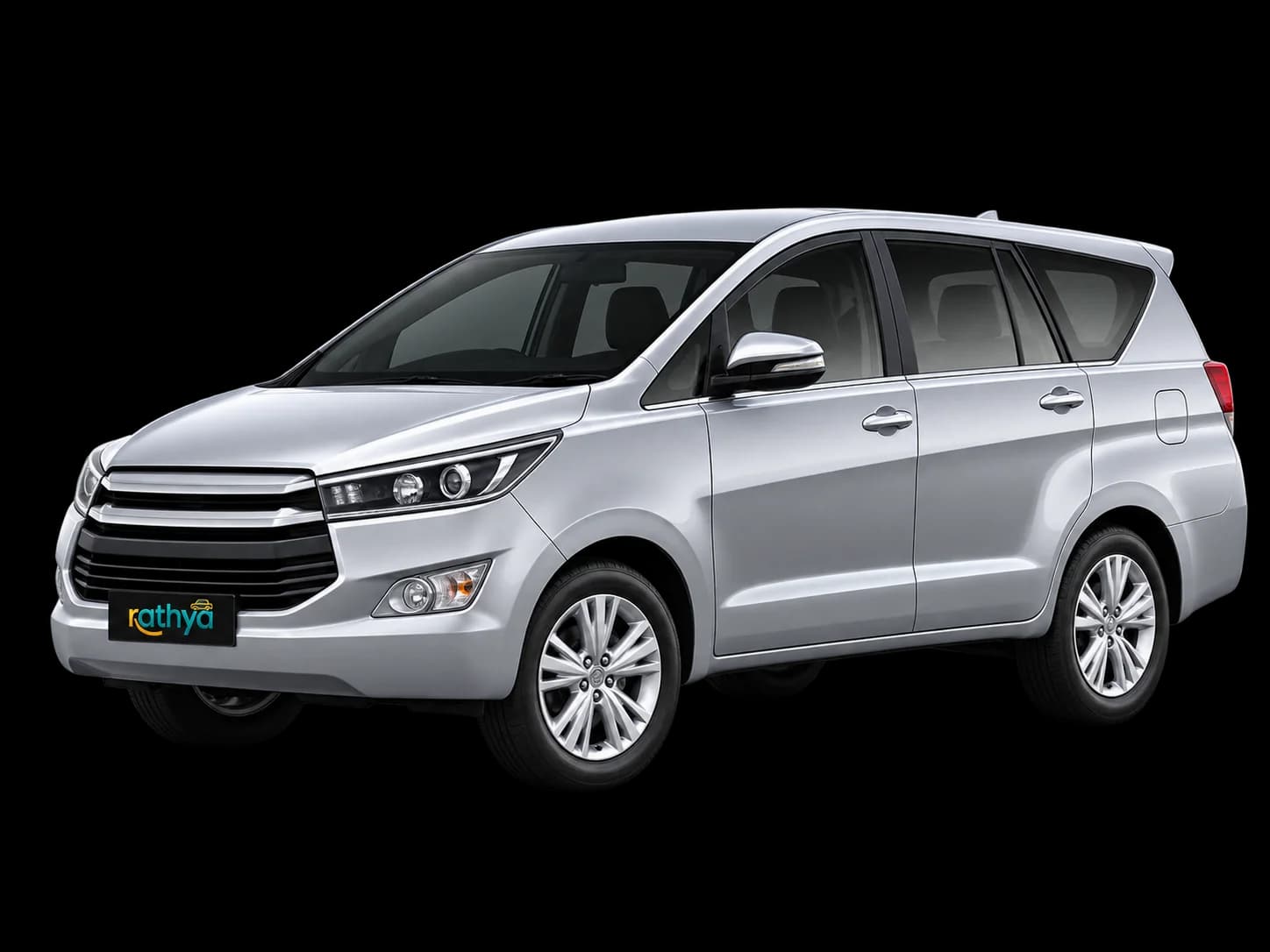 White Rathya Innova Crysta entering the route